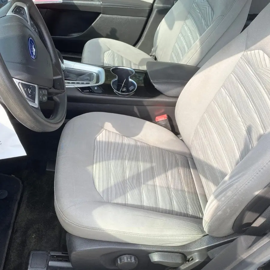 After: the same seat shampoo-extracted and steam-cleaned by J&W Mobile Detailing