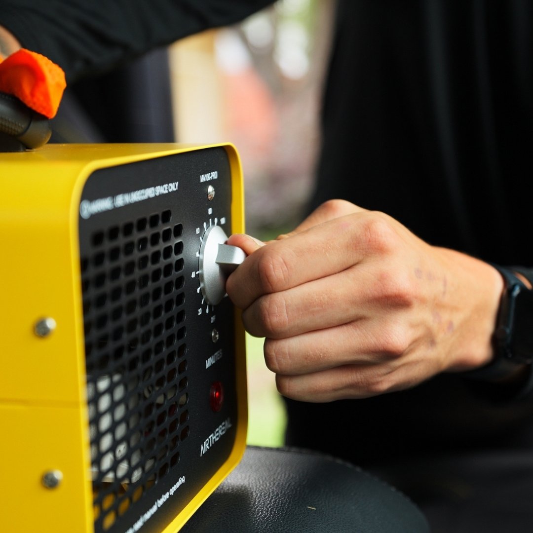 Ozone generator running inside a vehicle for odor removal in Oakland