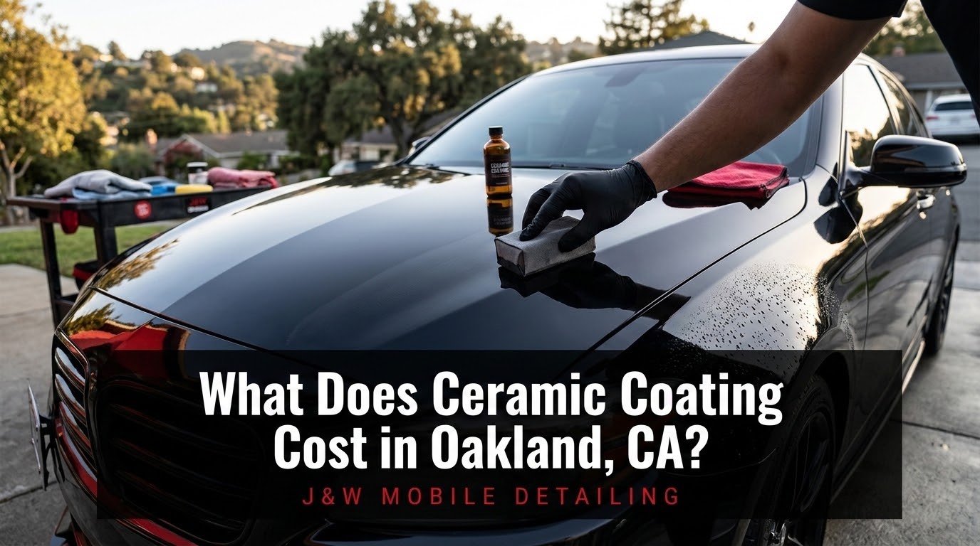 Jalil applying ceramic coating to a black sedan at a customer home